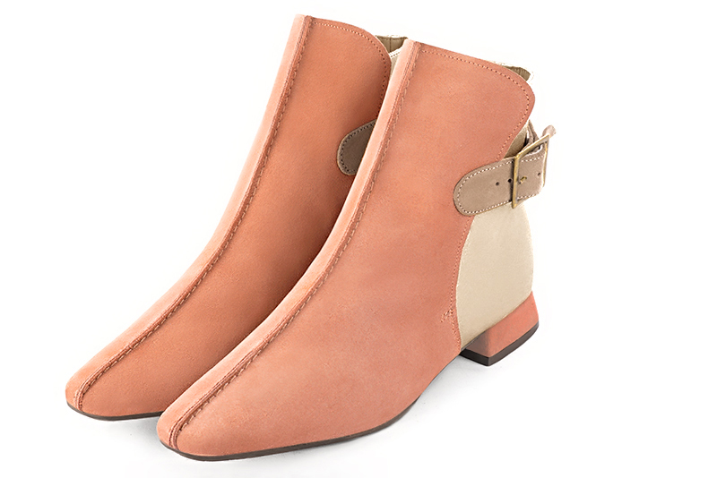 Peach orange, gold and tan beige women's ankle boots with buckles at the back. Square toe. Flat flare heels. Front view - Florence KOOIJMAN